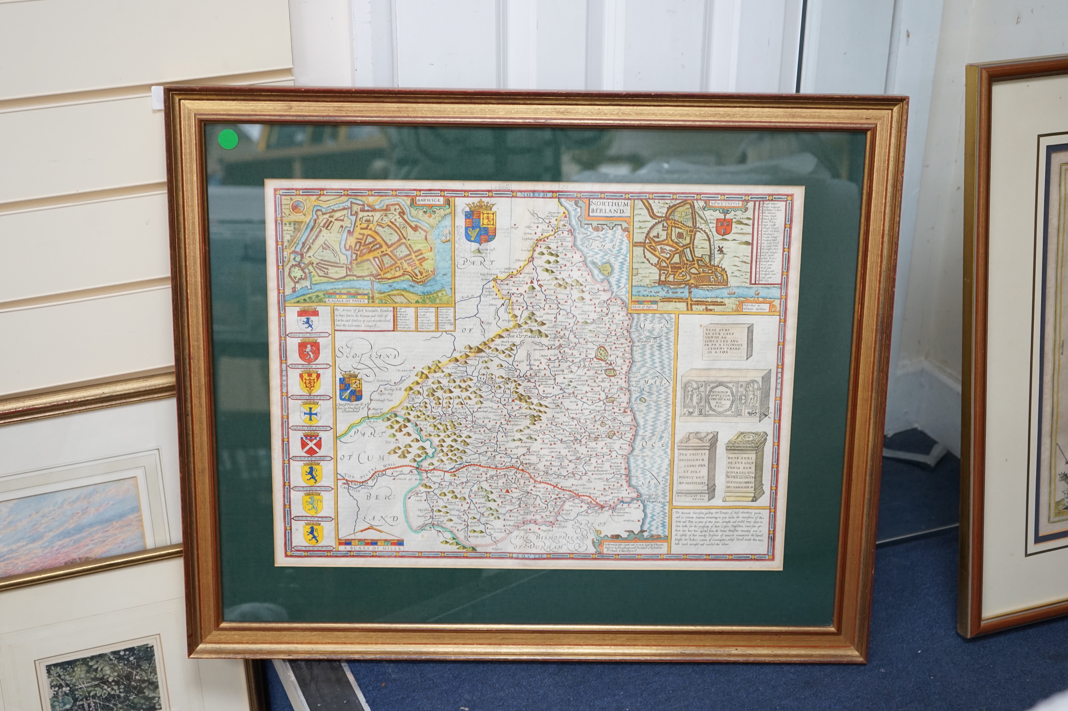 John Speed (1552-1629) hand-coloured engraved map of Northumberland, sold by Thomas Basset and Richard Chiswell, text verso, 39 x 63cm